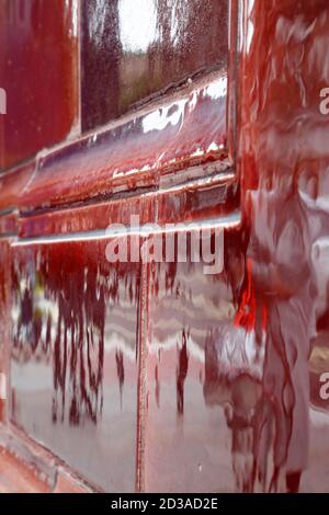 Oxblood tiles on the outside of Hampstead tube station, Hampstead, Londnon, UK Stock Photo