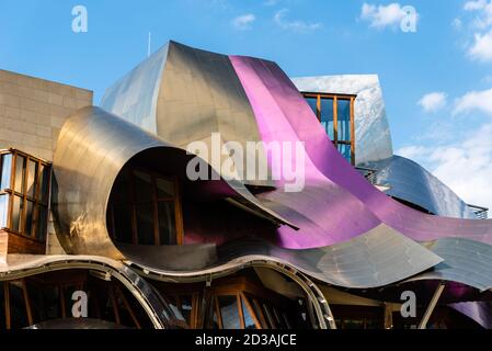 Elciego, Spain - 6 August 2020: Winery of Marques de Riscal in Alava, Basque Country. The futuristic building and luxury hotel was designed by famous Stock Photo