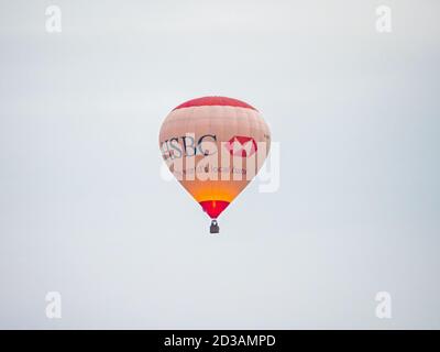 HSBC Hot air balloon flying over Staffordshire, UK Stock Photo
