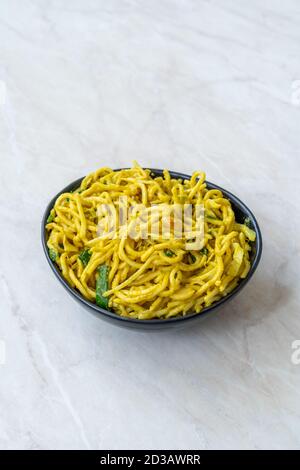 Satay Noodle with Curry, Turmeric Sauce and Peanut Butter. Traditional Food. Stock Photo