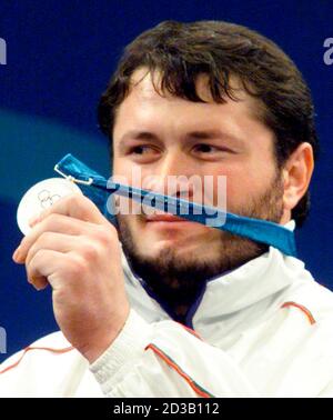 Sydney 2000 Olympics - Weightlifting - Men's 62kg. Australia's Yurik ...