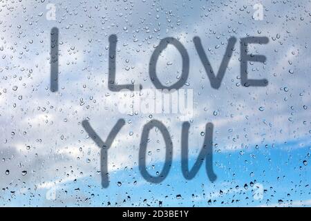 Writing i love you on steamy window. Valentine's day background Stock Photo