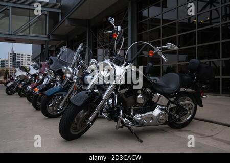 Milwaukee, WI, USA May 28 2011: Shiny motorcycles parked outside of the Harley-Davidson Museum building entrance in Milwaukee, Wisconsin. Stock Photo