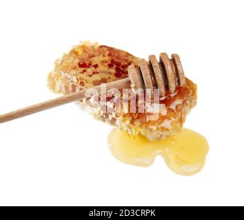Honeycomb and honey dipper. Isolated on white background Stock Photo