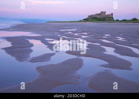 Bamburgh Castle from Bamburgh beach, Bamburgh, Northumberland. Summer (July 2019) Stock Photo