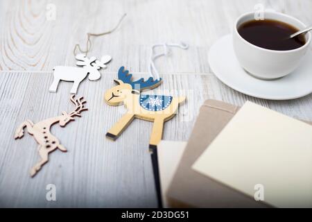 A porcelain cup with coffee on a long empty table. Space for text. Stock Photo