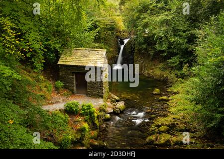 Waterfall and Victorian grotto at Rydal Hall near Ambleside, Lake District National Park, Cumbria, UK. Stock Photo