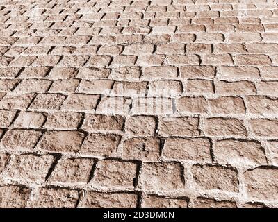 Urban stone paving stones. Texture, background, selective focus Stock Photo