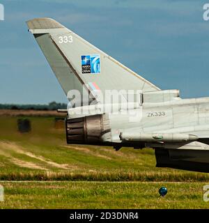 Lossiemouth Eurofighters FGR4s returning to UK after Op' Azotize in Lithuania, supporting NATO Baltic Air Policing. All four carry the NATO 70th badge Stock Photo