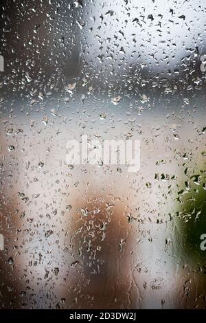 Drops of rain on glass , rain drops on clear window Stock Photo