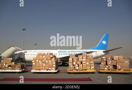 (201008) -- KABUL, Oct. 8, 2020 (Xinhua) -- Photo taken on Oct. 8, 2020 shows anti-epidemic supplies from China during the handover ceremony at Hamid Karzia International Airport in Kabul, capital of Afghanistan. Afghanistan on Thursday received more anti-epidemic supplies from China to aid its fight against COVID-19. They were in the sixth batch of Chinese aid to the war-torn Asian country which was hit by the outbreak of COVID-19 in late February. (Photo by Rahmatullah Alizadah/Xinhua) Stock Photo