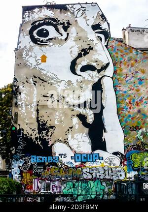 Graffiti with Salvador Dali on the wall near the Centre of Georges Pompidou in Paris, France. Stock Photo
