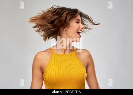 happy young woman shaking head Stock Photo