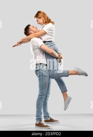happy couple in white t-shirts Stock Photo