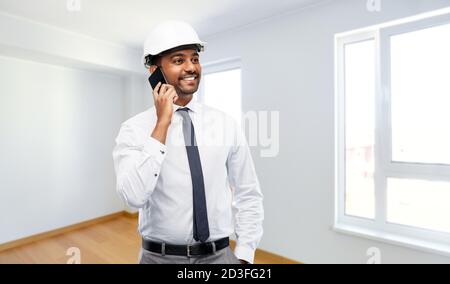 indian male architect calling on smartphone Stock Photo