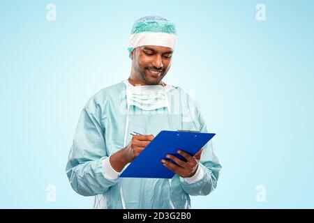 indian male doctor or surgeon with clipboard Stock Photo