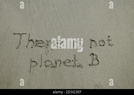 there is no planet B, ecology concept, text on sand, environmental conservation Stock Photo