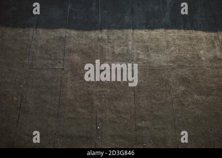 Bitumen roof on an industrial hall combined with tin attic Stock Photo
