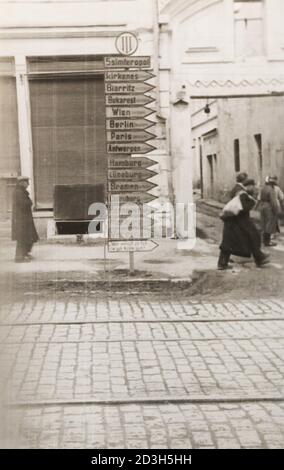 Pointer with the names of cities in Crimea. Photo of the period of the German occupation of the 1940s. Stock Photo