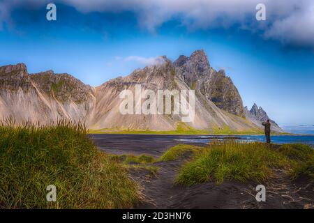 The wild and beautiful Vestrahorn mountain in early evening hours - Höfn, Iceland Landscape Stock Photo