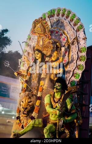 Kolkata, West Bengal, India, October, 2019 : Goddess Durga idol going for Immersion. Durga puja carnival. Indian Hindu festive celebration ceremony at Stock Photo