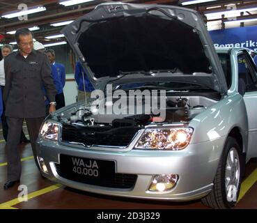 Malaysian Prime Minister Mahathir Mohamed Inspects The Proton Latest Model Waja At The Company S Assembly Plant Near Kuala Lumpur July 5 2001 Malaysia S Largest Carmaker Perusahaan Otomobil Nasional Bhd Proton On Thursday Rolled Out Their