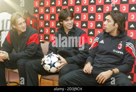 European club champion AC Milan's Rui Manuel Cesar Costa (R) of Portugal, Kaka (C) of Brazil and Massimo Ambrosini of Italy attend a news conference in Yokohama, south of Tokyo December 12, 2003. AC Milan will play against Boca Juniors of Argentina in European-South American Cup club soccer championship in Yokohama on Sunday. REUTERS/Issei Kato  IK/CP