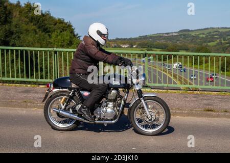 2015 Royal Enfield Continental GT; Motorbike rider; two wheeled transport, motorcycles, vehicle, roads, motorbikes, bike riders motoring in Chorley, UK Stock Photo