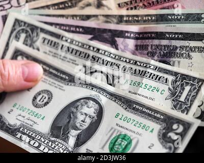 Ukraine. 8th Oct, 2020. In this photo illustration a 2 dollar bill with various dollar bills. Credit: Igor Golovniov/SOPA Images/ZUMA Wire/Alamy Live News Stock Photo