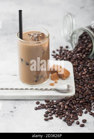 Iced coffee in jar, mug glass cup on the white table Stock Photo - Alamy