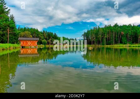 Panorama Lake of Fie in summer at the Sciliar Alpe di Siusi Dolomites north Italy Stock Photo