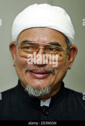 Acting President Of Malaysia S Islamic Opposition Parti Islam Se Malaysia Pas Abdul Hadi Awang Smiles Before A Meeting In Kuala Lumpur February 9 2003 Pas Accused The Government On Sunday Of A Slur Campaign After A Newspaper Said Hadi