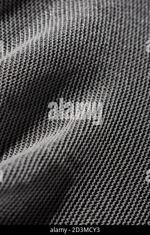 Texture of a fine white mesh on black background Stock Photo