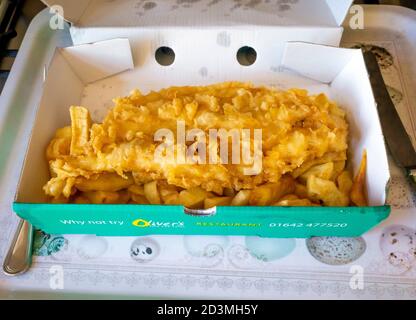 Take away Fish and Chips from Olivers fish and chip shop in Redcar in a cardboard box on a tray Stock Photo