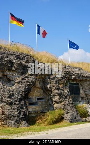 Fort Douaumont, France, bunker and old fortress with flags from Germany, France and Europe Stock Photo