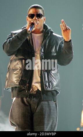 Nelly performs 'N Dey Say' at the 2004 Billboard Music Awards at the MGM Grand Garden Arena in Las Vegas December 8, 2004. R&B singer Usher, who scored the biggest album of the year and four No. 1 singles, picked up 11 trophies at the Billboard Music Awards in Las Vegas on Wednesday, with Alicia Keys, OutKast and Grammys frontrunner Kanye West also sharing in the spoils. REUTERS/Ethan Miller  EM/FA