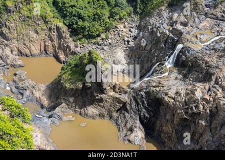 An aerial view of the Barron waterfalls, in the Barron gorge near Cairns, Australia, on a sunny day in the dry season. Stock Photo