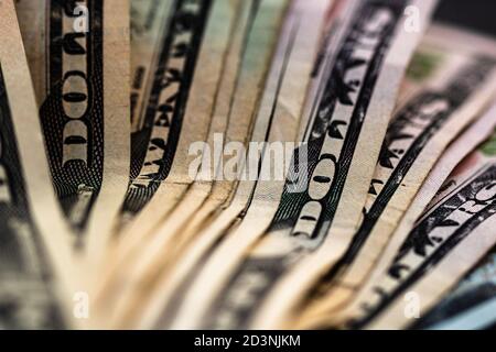 Selective focus on detail of dollars banknotes. Close up macro detail of money banknotes, dollars isolated. World money concept, inflation and economy Stock Photo