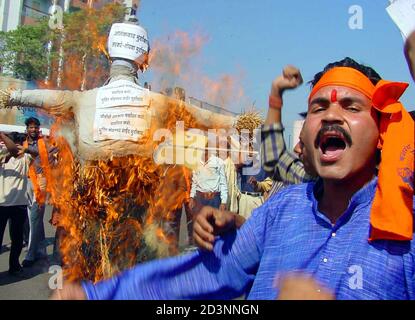 A Members Of The Hardline Hindu Group The Bajrang Dal Brandishes A ...