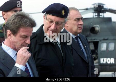 Belgium's King Albert II (C), meets Bernard Kouchner (L), the UN administrator in Kosovo, on his arrival in Kosovo's capital of Pristina October 12, 2000. Belgium's King Albert II came to visit some 200 Belgian soldiers based in Macedonia as a part of his' Kosovo tour.