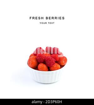 Fresh strawberries and raspberries in a white Cup isolated on a white background. Stock Photo