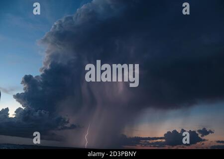 Dark clouds over the ocean during a tropical storm above caribbean see Stock Photo