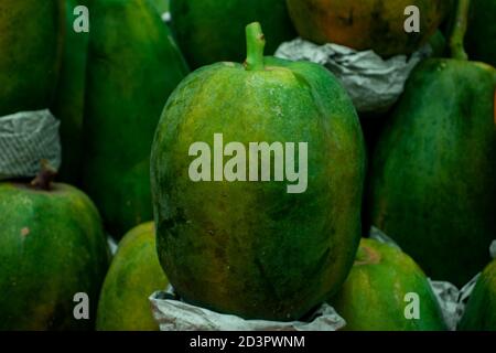 Papaya fruit for sale at the street market in Dhaka, Food background and texture Stock Photo