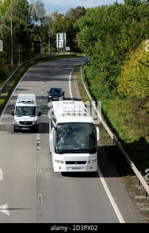 A coach on the slip road at Junction 15 of the M40 motorway, Warwickshire, UK Stock Photo