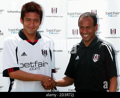 Fulham Football Club New Signing Japan S Junichi Inamoto C Talks To The Media At A News Conference In London July 19 02 Inamoto Has Transferred From North London Club Arsenal Reuters Stephen Hird