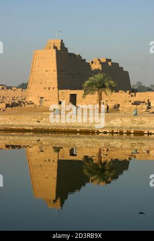 The Temple of Karnak is the second largest temple in ancient Egypt and an old religious center. It is located on the banks of the Nile in Luxor. Stock Photo