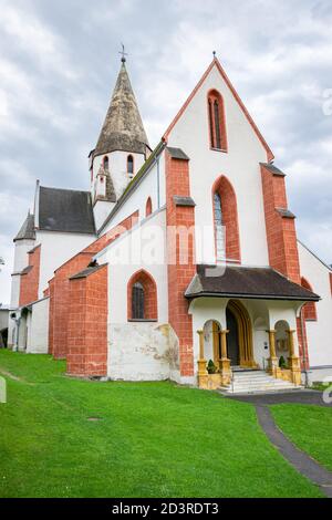 Saint Matthew Church, located on a fortified hill in the historic town of Murau in state Styria, Austria. Stock Photo