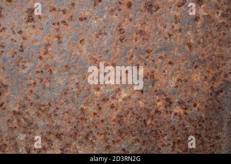 Dark worn out rusty metal sheet. Texture background. Stock Photo