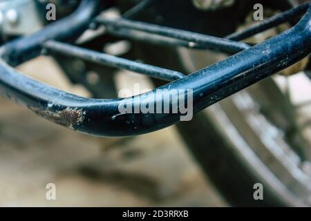 Closeup of a motorcycle rolling in the streets of the city center of the metropolitan area Stock Photo