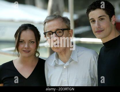 Woody Allen (R), and actors Christina Ricci and Jason Biggs pose for photographers as they arrive at Venice Lido August 27, 2003. Allen is in Venice to present his latest movie 'Anything Else' out of competition that will kick of the 60th annual Venice film festival.